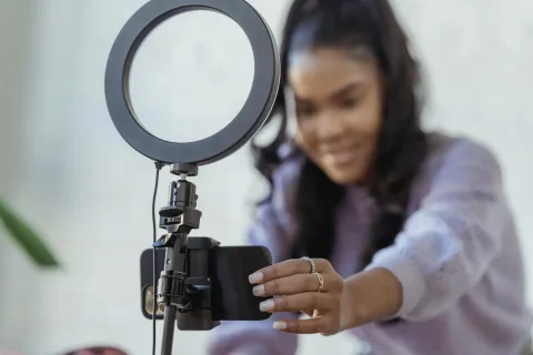 a woman doing a tiktok video